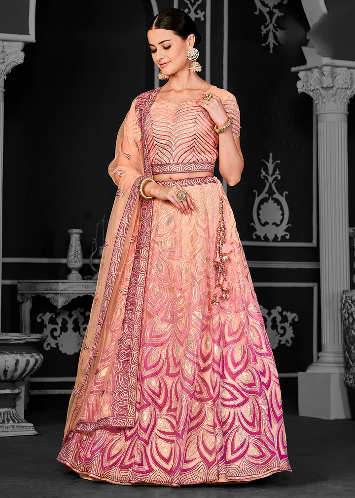 Buy Now Lovely Peach Net Embroidered Bridal Party Lehenga Choli Online in USA, UK, Canada, France, Italy, Germany, Australia & Worldwide at Empress Clothing.