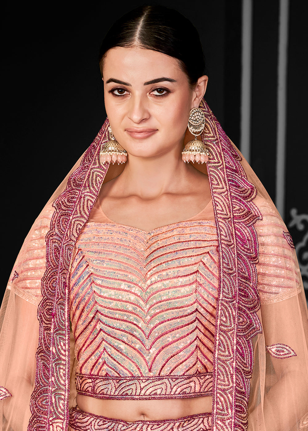 Buy Now Lovely Peach Net Embroidered Bridal Party Lehenga Choli Online in USA, UK, Canada, France, Italy, Germany, Australia & Worldwide at Empress Clothing.