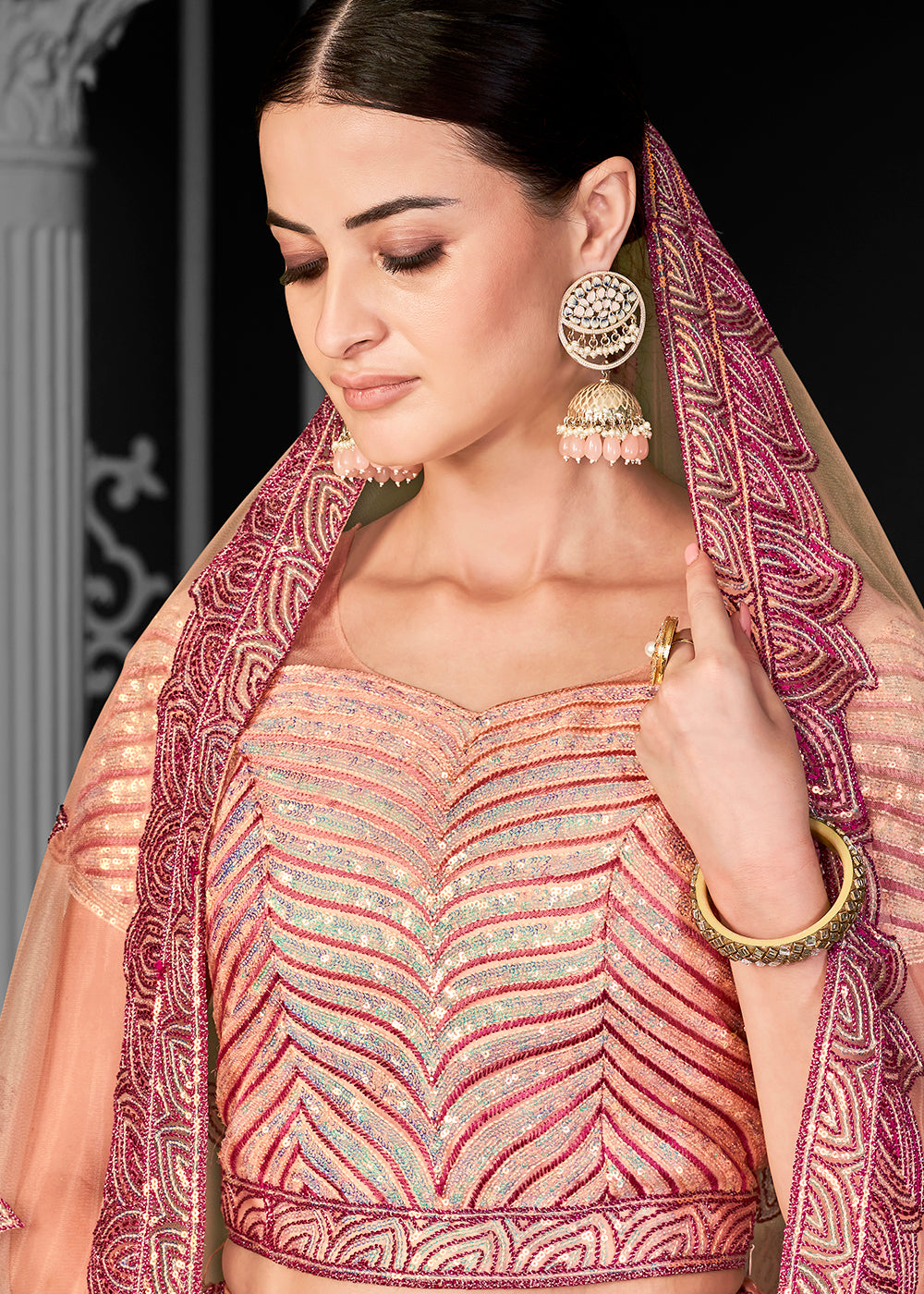 Buy Now Lovely Peach Net Embroidered Bridal Party Lehenga Choli Online in USA, UK, Canada, France, Italy, Germany, Australia & Worldwide at Empress Clothing.