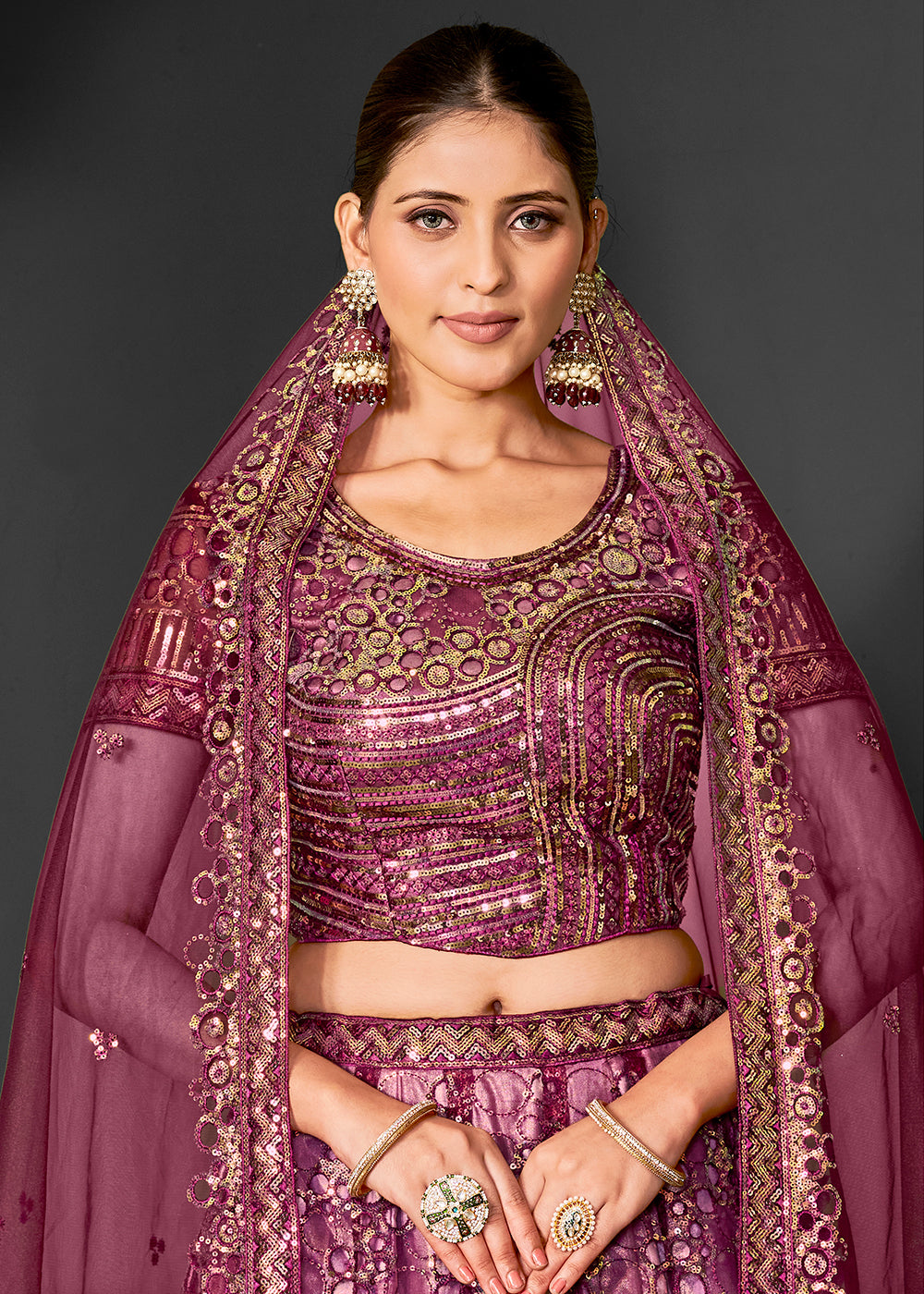 Buy Now Pretty Wine Net Embroidered Bridal Party Lehenga Choli Online in USA, UK, Canada, France, Italy, Germany, Australia & Worldwide at Empress Clothing.
