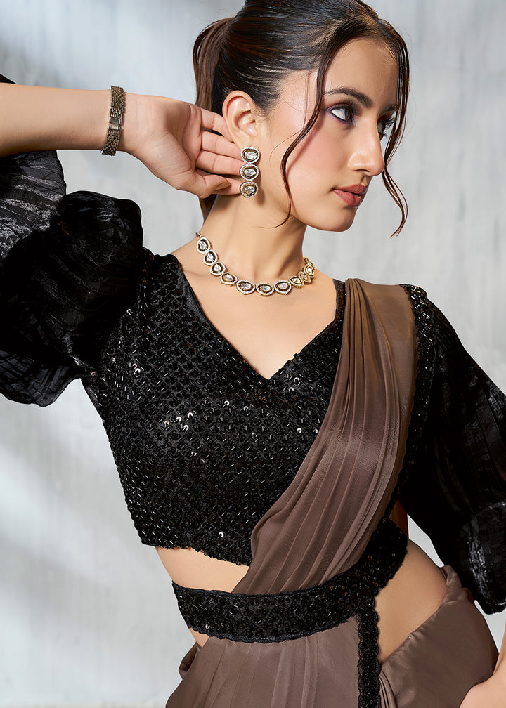 Buy Chiku Black Designer Embroidered Party Wear Saree Online in USA, UK, Canada, Spain, France, Germany, Italy, Austria, Spain, Japan & Worldwide at Empress.