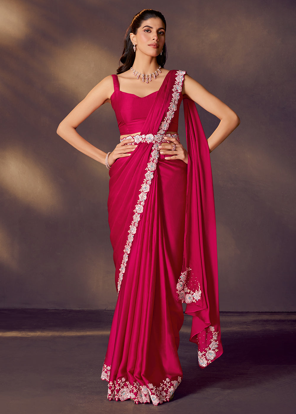 Buy Fuchsia Pink Designer Party Style Pre Draped Saree Online in US, UK, Canada, Spain, France, Germany, Italy, Austria, Ireland, Sweden & Worldwide at Empress.