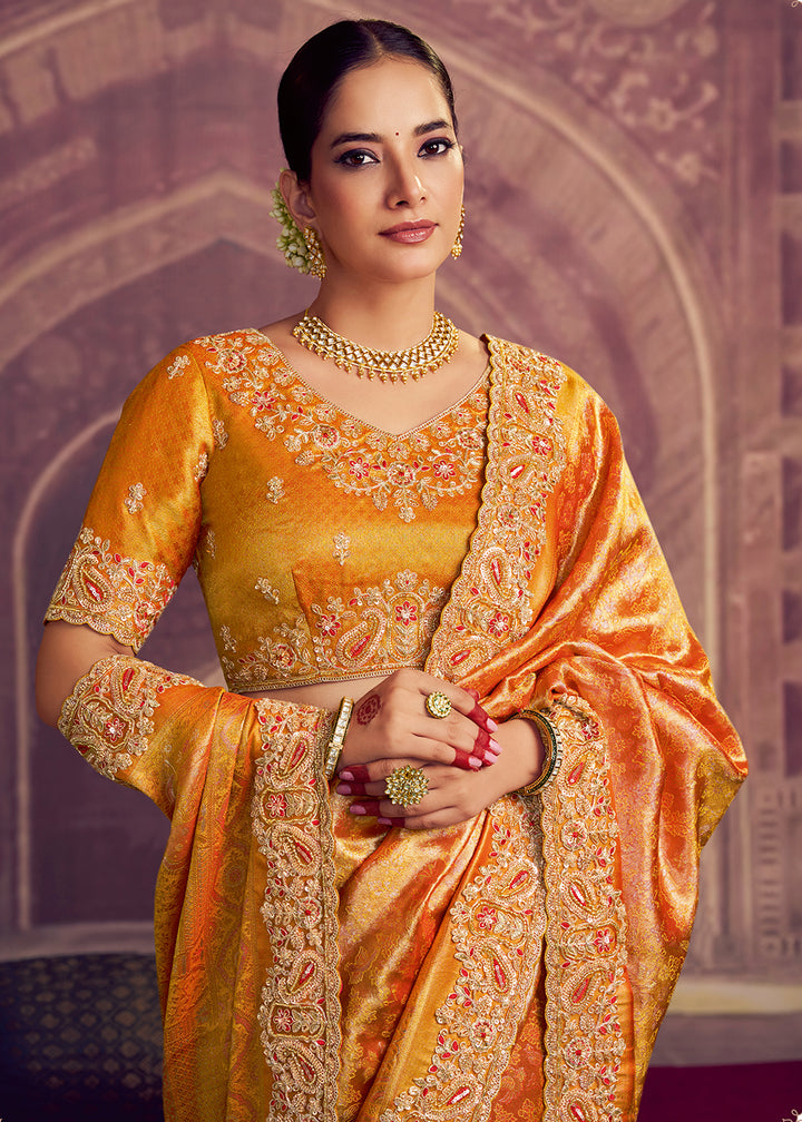 Buy Now Dreamy Gold Heavy Embroidered Designer Wear Saree Online in US, UK, Canada, France, Germany, Denmark, Netherland, Sweden, UAE & Worldwide at Empress.