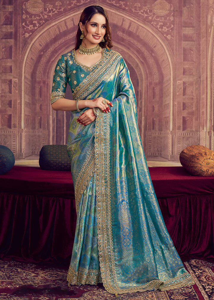 Buy Now Dreamy Firozi Heavy Embroidered Designer Wear Saree Online in US, UK, Canada, France, Germany, Denmark, Netherland, Sweden, UAE & Worldwide at Empress.