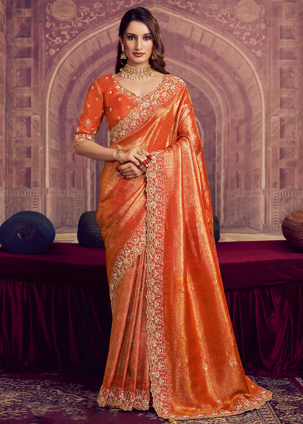 Buy Now Dreamy Orange Heavy Embroidered Designer Wear Saree Online in US, UK, Canada, France, Germany, Denmark, Netherland, Sweden, UAE & Worldwide at Empress.
