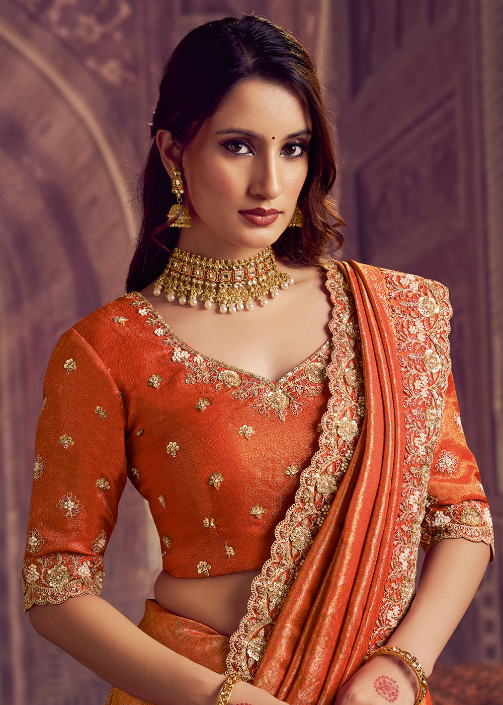 Buy Now Dreamy Orange Heavy Embroidered Designer Wear Saree Online in US, UK, Canada, France, Germany, Denmark, Netherland, Sweden, UAE & Worldwide at Empress.