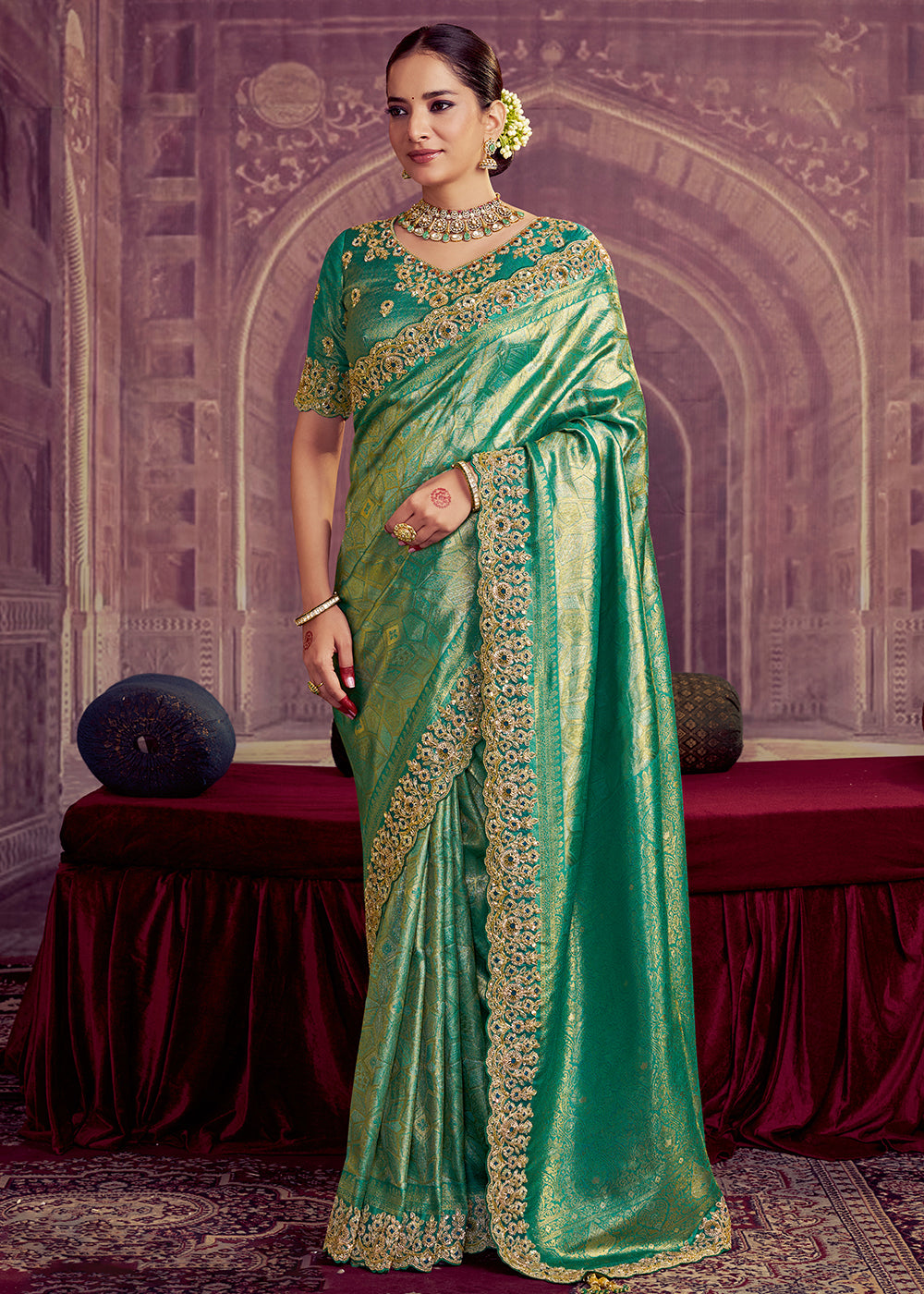 Buy Now Dreamy Green Heavy Embroidered Designer Wear Saree Online in US, UK, Canada, France, Germany, Denmark, Netherland, Sweden, UAE & Worldwide at Empress.