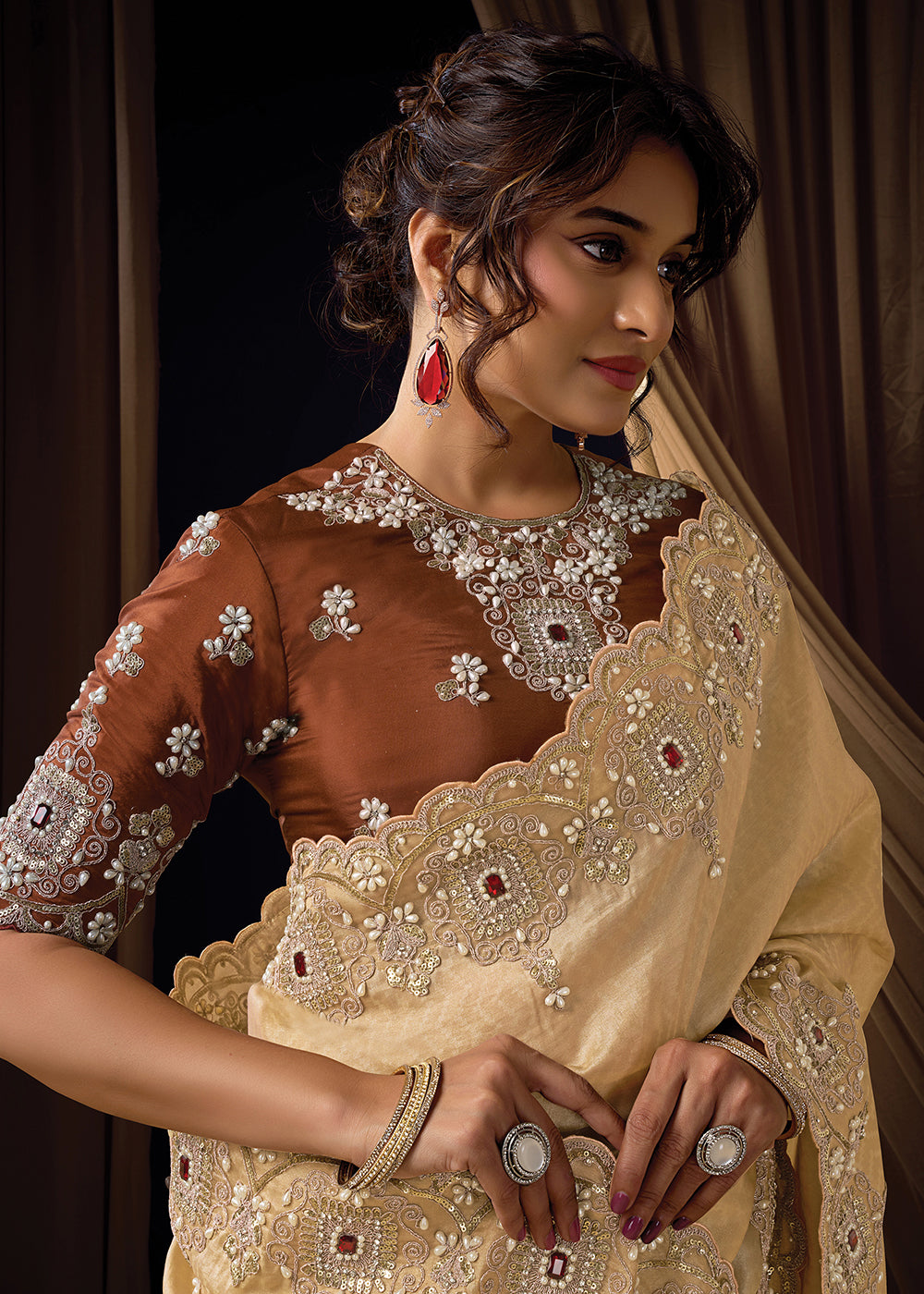 Buy Now Premium Beige Brown Embroidered Heavy Designer Wear Saree Online in US, UK, Canada, France, Germany, Denmark, Netherland, Sweden & Worldwide at Empress.