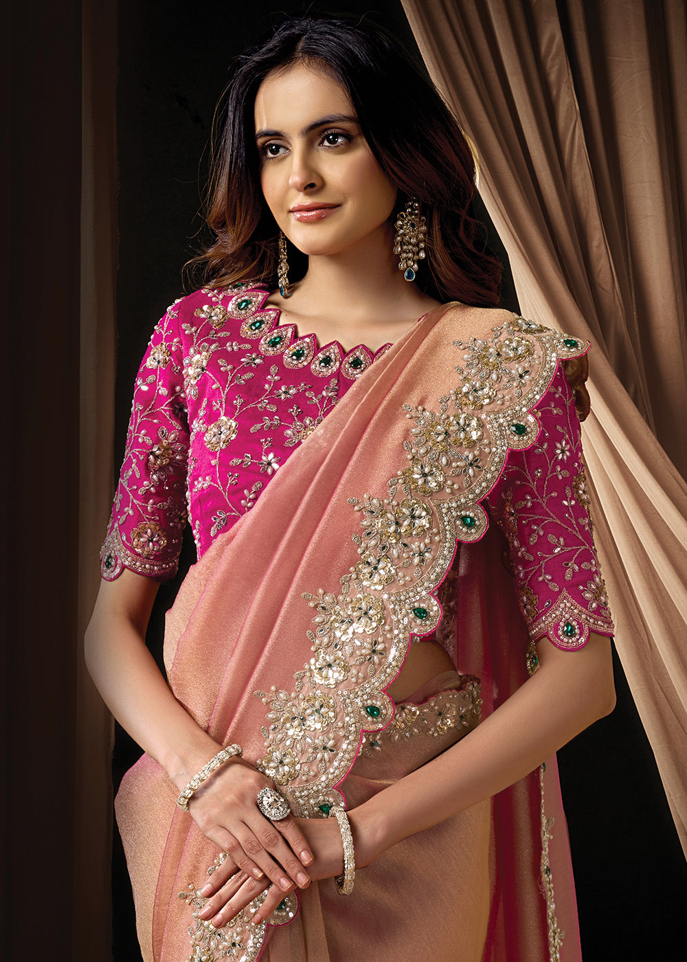Buy Now Premium Peachy Pink Embroidered Heavy Designer Wear Saree Online in US, UK, Canada, France, Germany, Denmark, Netherland, Sweden & Worldwide at Empress.
