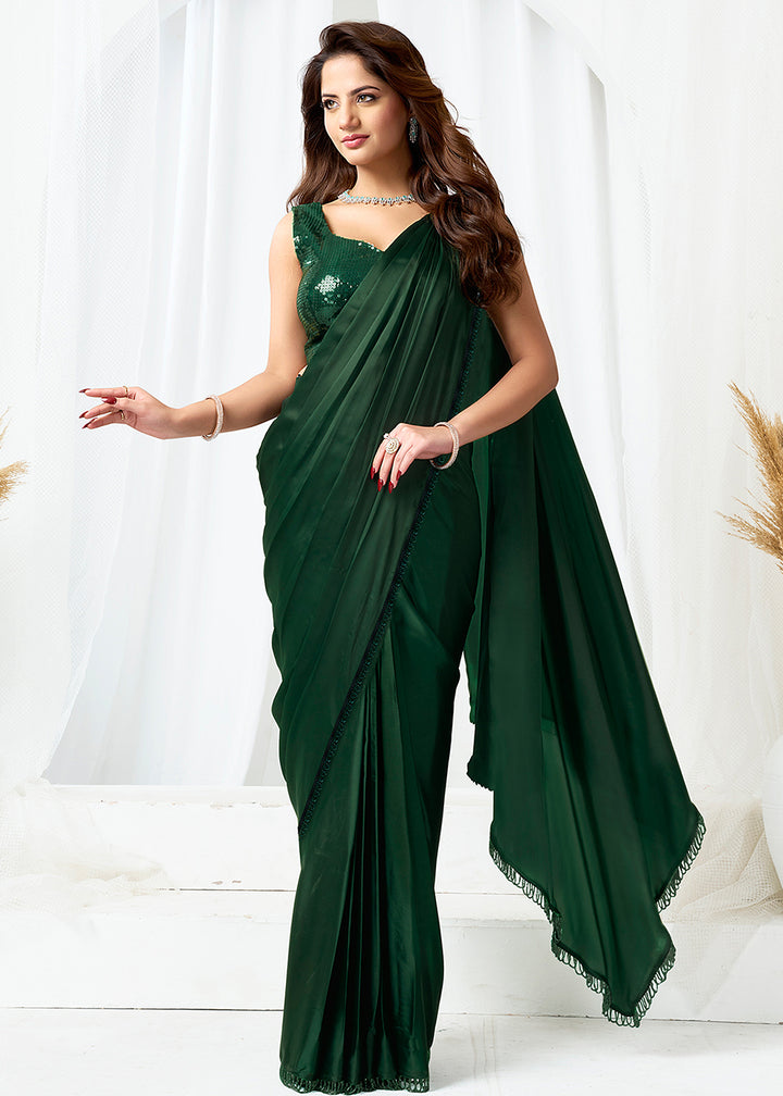 Buy Bottle Green Fancy Material Designer Party Wear Saree Online in US, UK, Canada, France, Germany, Italy, Austria, Ireland, Sweden & Worldwide at Empress.