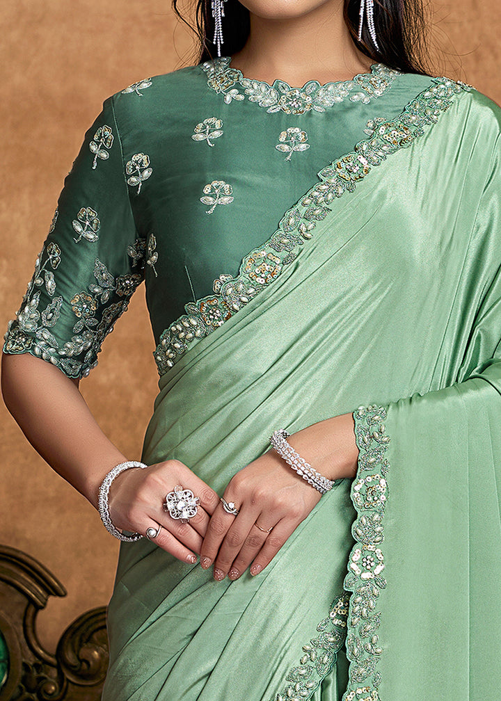 Buy Now Pastel Green Embroidered Wedding Festive Wear Saree Online in US, UK, Canada, France, Germany, Denmark, Netherland, Sweden, UAE & Worldwide at Empress.