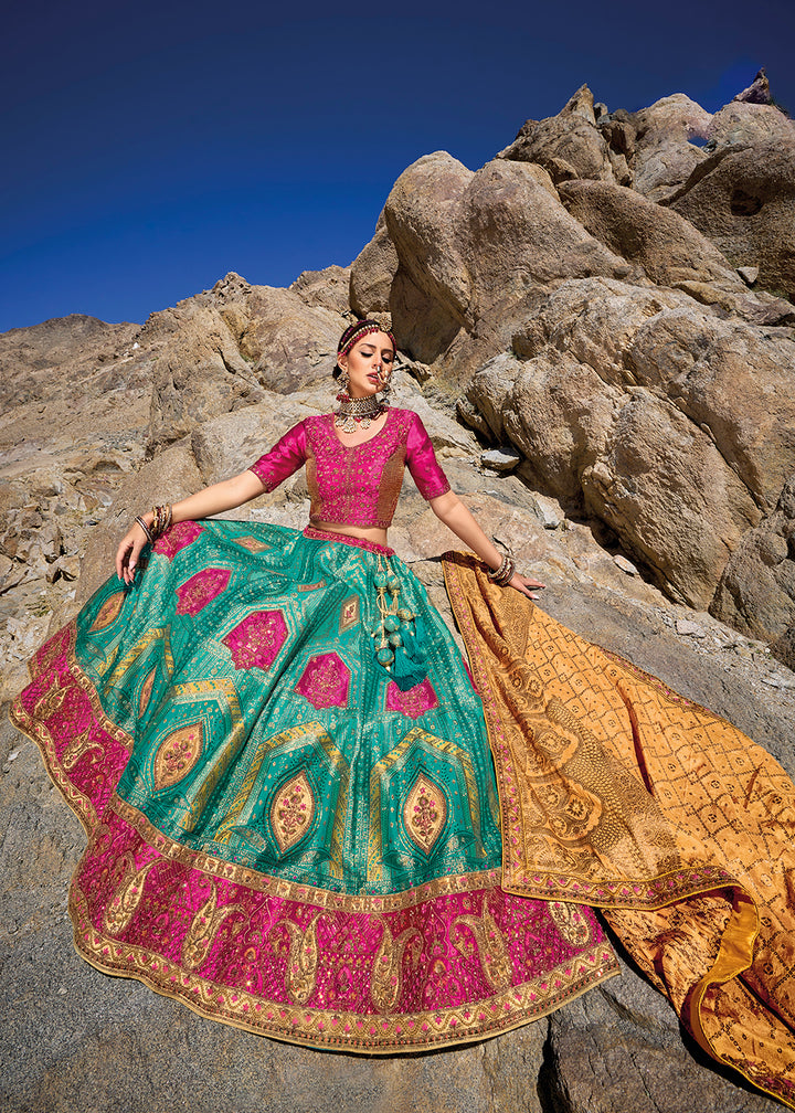 Buy Now Turquoise Pink Designer Style Embroidered Traditional Lehenga Choli Online in USA, UK, Canada & Worldwide at Empress Clothing.