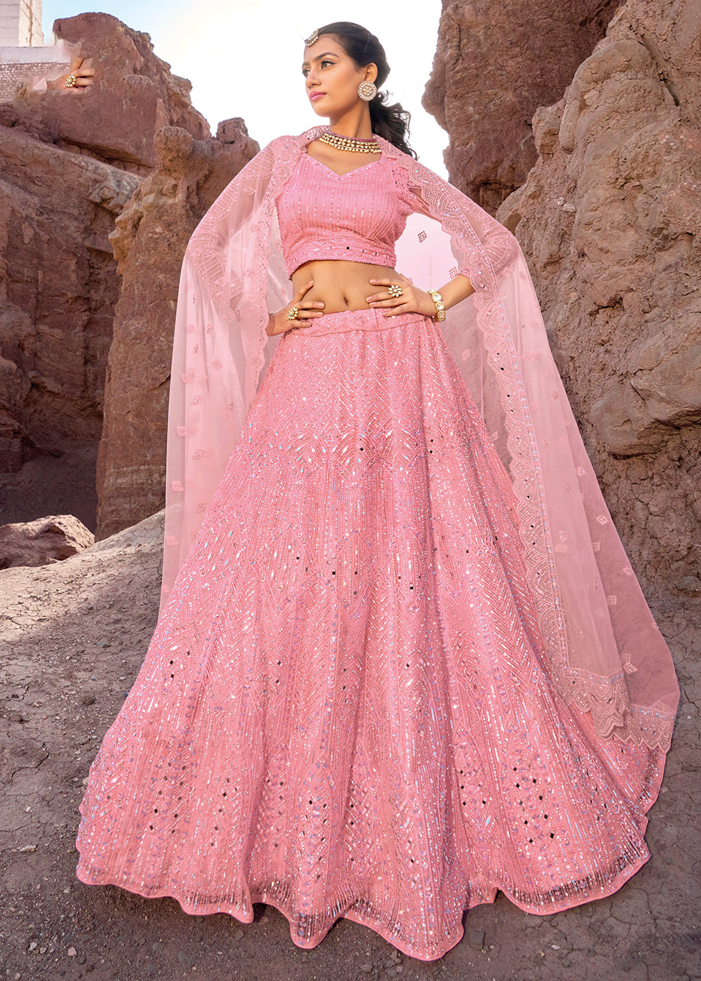 Buy Now Coral Pink Embroidered Pure Net Designer Bridal Lehenga Choli Online in USA, UK, Canada & Worldwide at Empress Clothing. 