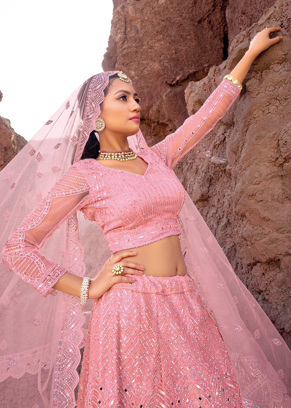 Buy Now Coral Pink Embroidered Pure Net Designer Bridal Lehenga Choli Online in USA, UK, Canada & Worldwide at Empress Clothing. 
