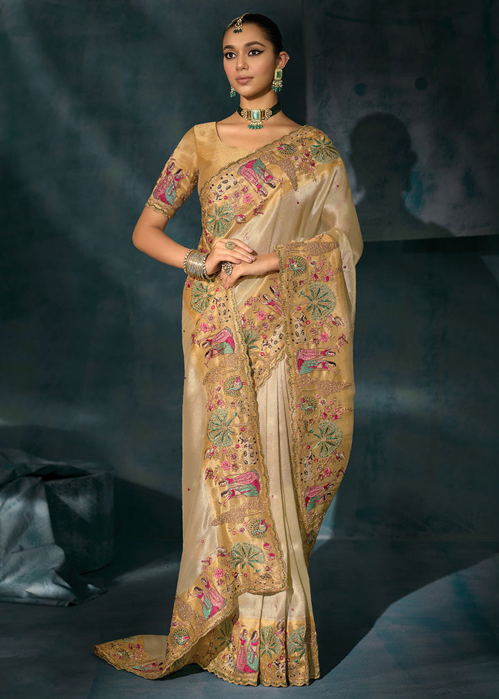 Buy Creamy Cut Dana & Mirror Work Designer Saree Online in US, UK, Canada, France, Germany, Italy, Denmark, Singapore, Belgium, UAE & Worldwide at Empress.