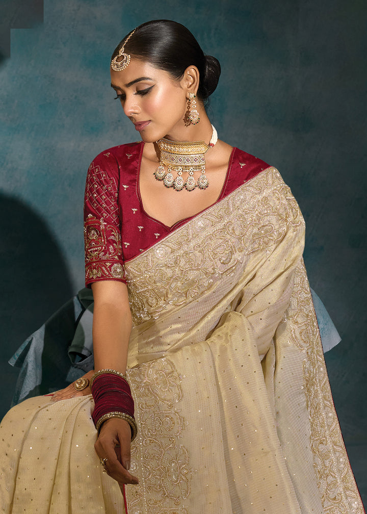 Buy Cream Silk Cut Dana & Mirror Work Designer Saree Online in US, UK, Canada, France, Germany, Italy, Denmark, Singapore, Belgium, UAE & Worldwide at Empress.