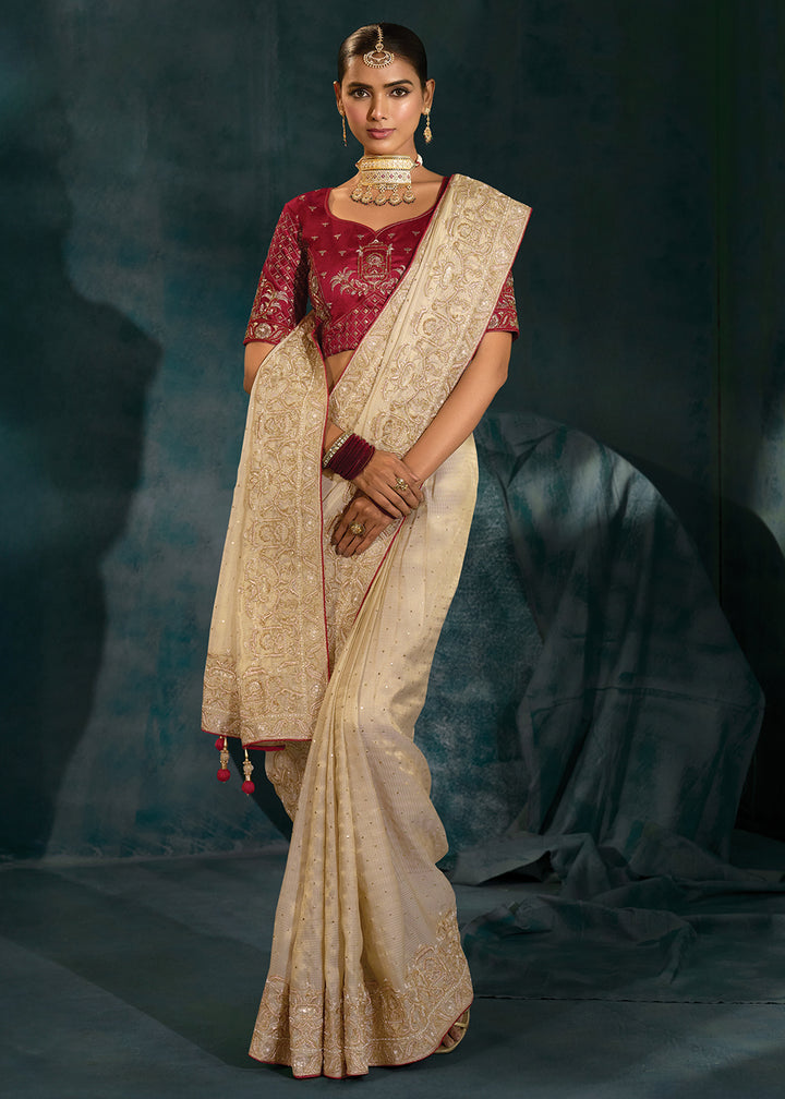 Buy Cream Silk Cut Dana & Mirror Work Designer Saree Online in US, UK, Canada, France, Germany, Italy, Denmark, Singapore, Belgium, UAE & Worldwide at Empress.