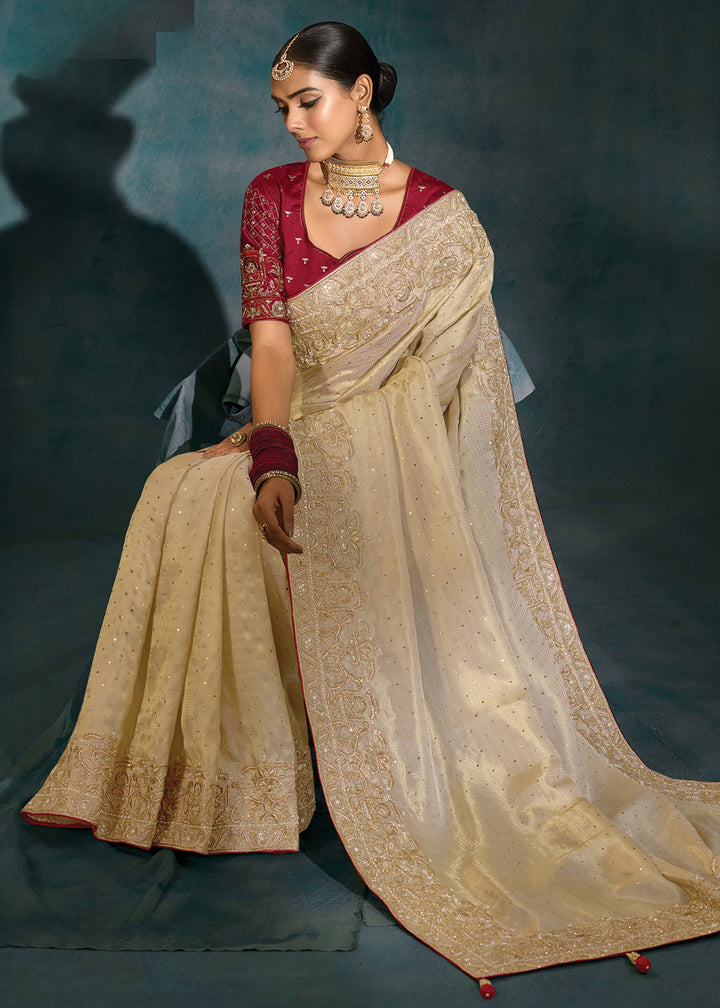Buy Cream Silk Cut Dana & Mirror Work Designer Saree Online in US, UK, Canada, France, Germany, Italy, Denmark, Singapore, Belgium, UAE & Worldwide at Empress.