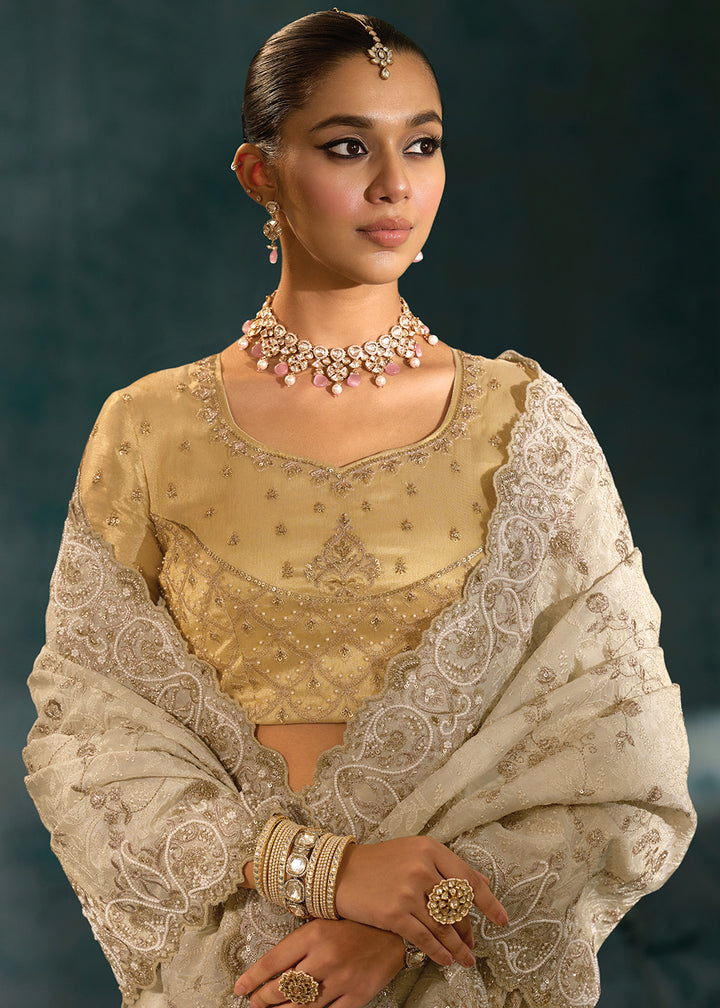 Buy Lucknowi Cream Cut Dana & Mirror Work Designer Saree Online in US, UK, Canada, France, Germany, Italy, Denmark, Singapore, Belgium & Worldwide at Empress.