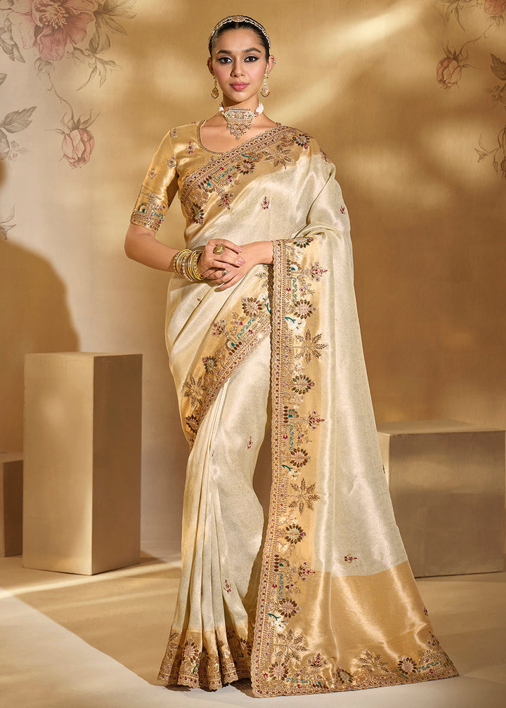 Buy Traditional Beige Heavy Embroidered Wedding Bridal Saree Online in US, UK, Canada, France, Germany, Denmark, Belgium, Sweden, UAE & Worldwide at Empress.