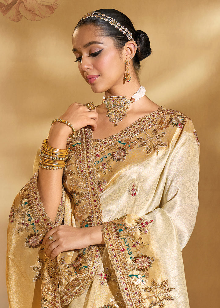 Buy Traditional Beige Heavy Embroidered Wedding Bridal Saree Online in US, UK, Canada, France, Germany, Denmark, Belgium, Sweden, UAE & Worldwide at Empress.
