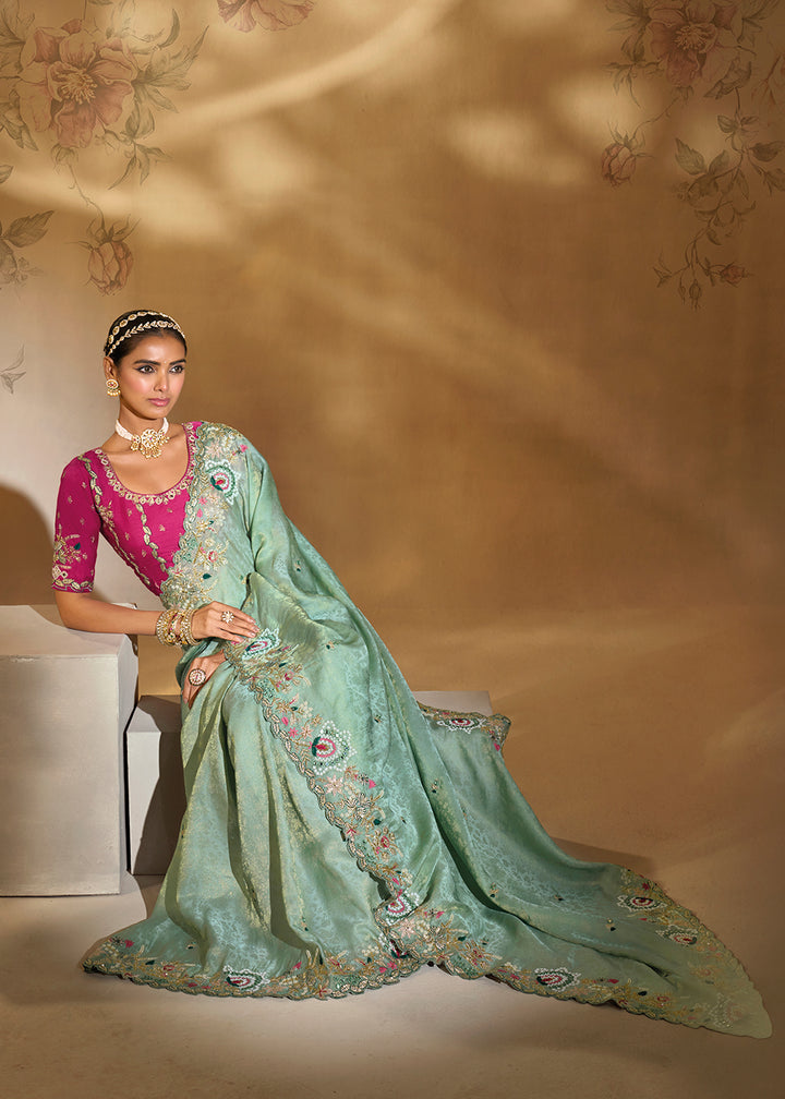 Buy Traditional Mint Green Heavy Embroidered Wedding Bridal Saree Online in US, UK, Canada, France, Germany, Denmark, Belgium, Sweden & Worldwide at Empress.