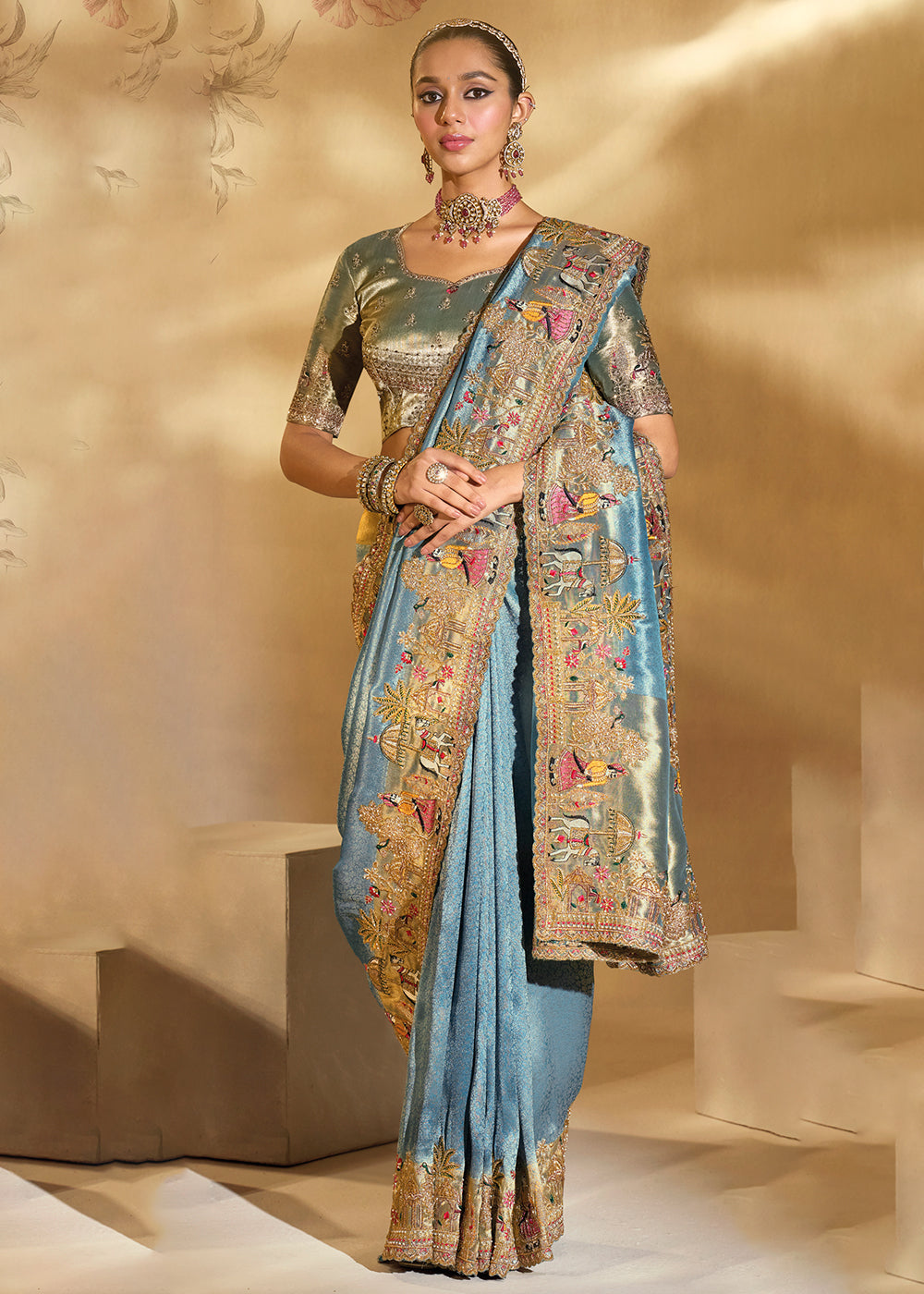 Buy Traditional Livid Blue Heavy Embroidered Wedding Bridal Saree Online in US, UK, Canada, France, Germany, Denmark, Belgium, Sweden & Worldwide at Empress.