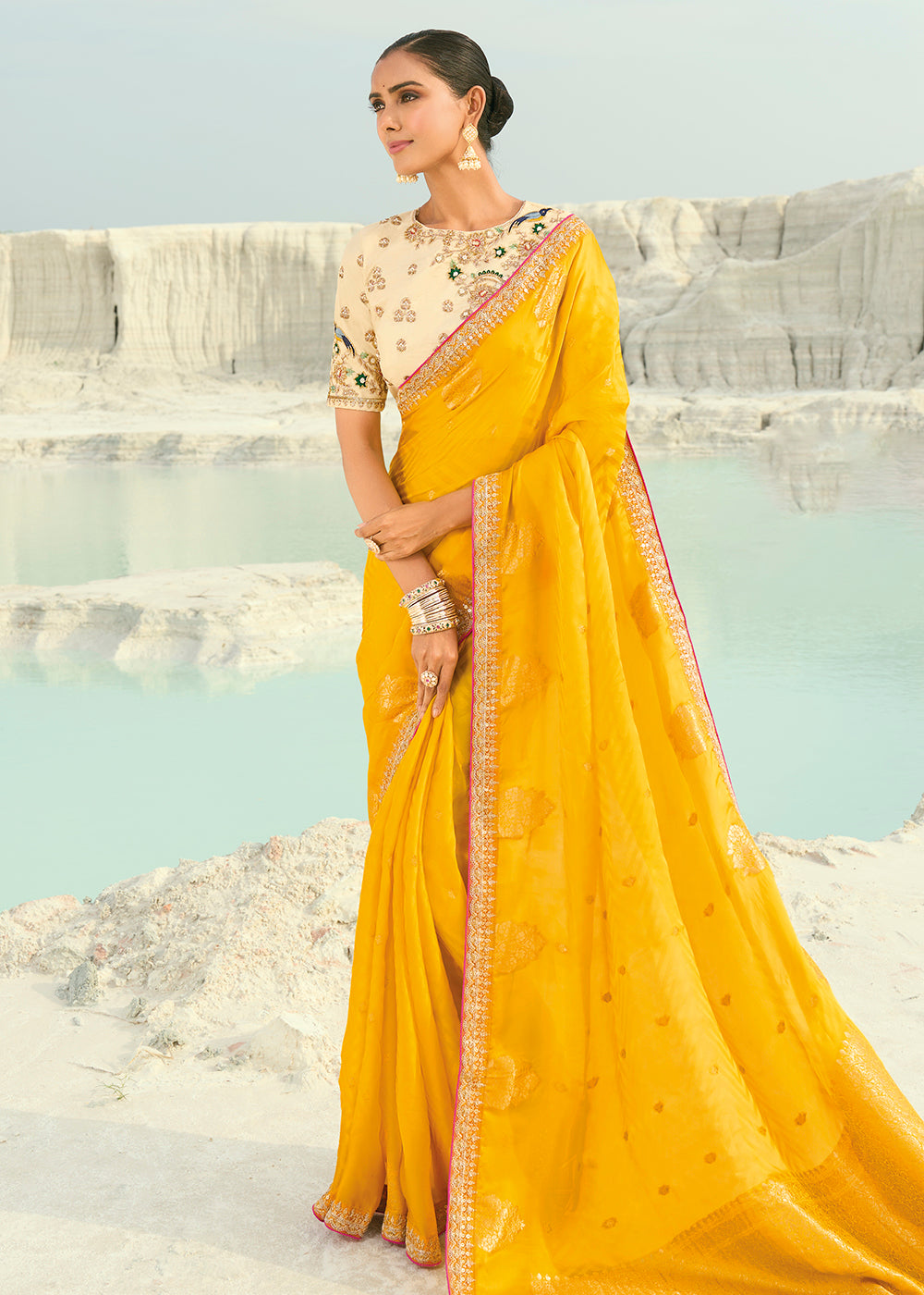 Buy Yellow Viscose Organza Traditional Embroidered Saree Online in US, UK, Canada, France, Germany, Denmark, Netherlands, Sweden, Greece & Worldwide at Empress.