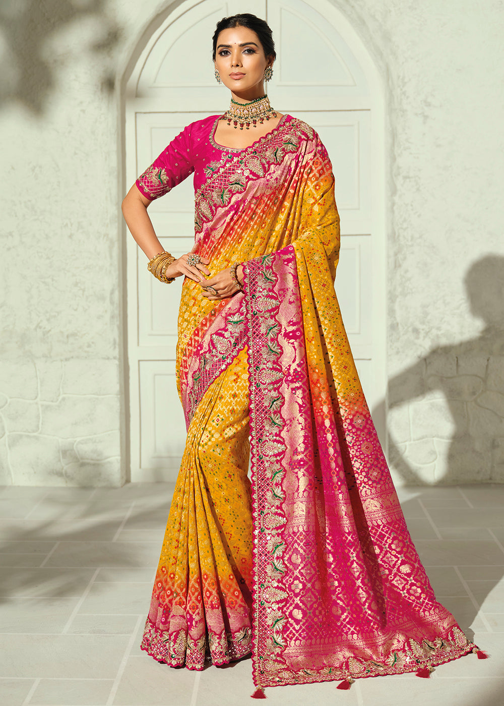 Buy Now Yellow Moti & Cut-Dana Heavy Bandhej Saree Online in US, UK, Canada, France, Germany, Denmark, Sweden, Australia, Austria, UAE & Worldwide at Empress.