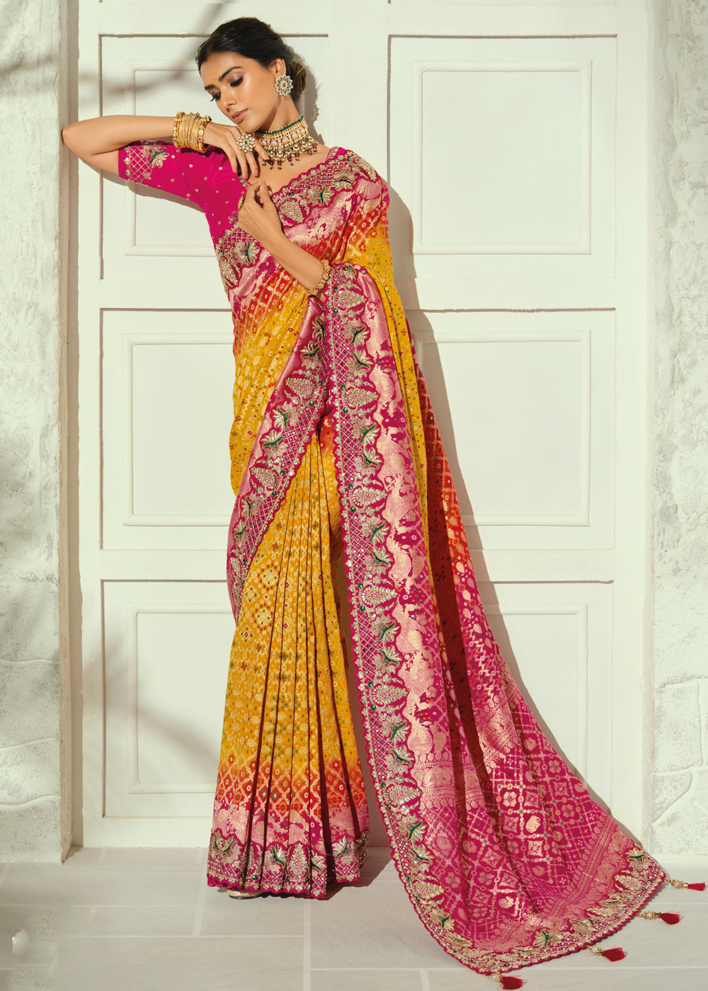 Buy Now Yellow Moti & Cut-Dana Heavy Bandhej Saree Online in US, UK, Canada, France, Germany, Denmark, Sweden, Australia, Austria, UAE & Worldwide at Empress.