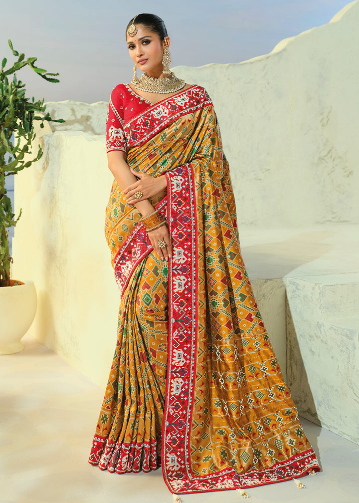 Buy Now Regal Mustard Patan Patola Style Traditional Wear Saree Set Online in US, UK, Canada, France, Germany, Denmark, Sweden, Austria &amp; Worldwide at Empress.