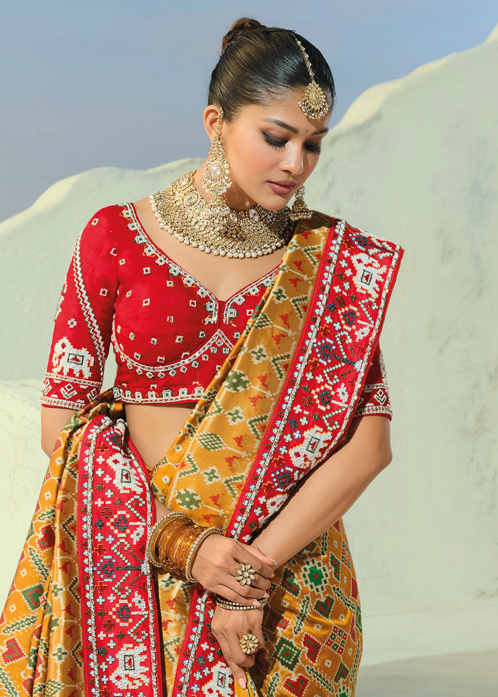 Buy Now Regal Mustard Patan Patola Style Traditional Wear Saree Set Online in US, UK, Canada, France, Germany, Denmark, Sweden, Austria & Worldwide at Empress.