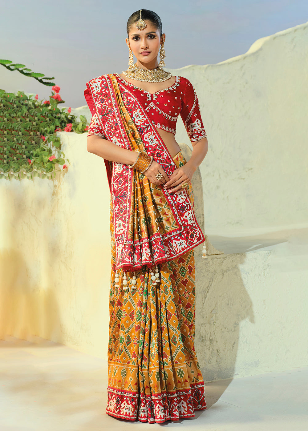 Buy Now Regal Mustard Patan Patola Style Traditional Wear Saree Set Online in US, UK, Canada, France, Germany, Denmark, Sweden, Austria &amp; Worldwide at Empress.