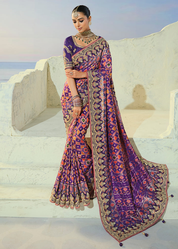 Buy Now Royal Purple Patan Patola Style Traditional Wear Saree Set Online in US, UK, Canada, France, Germany, Denmark, Sweden, Austria &amp; Worldwide at Empress.