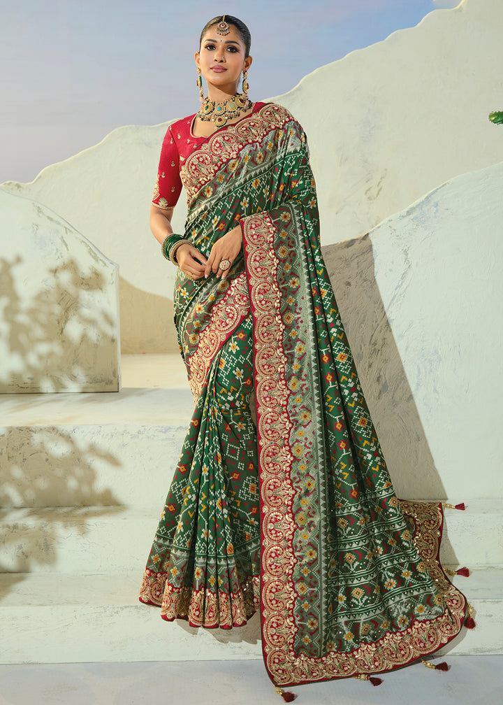 Buy Now Royal Green Patan Patola Style Traditional Wear Saree Set Online in US, UK, Canada, France, Germany, Denmark, Sweden, Austria &amp; Worldwide at Empress.