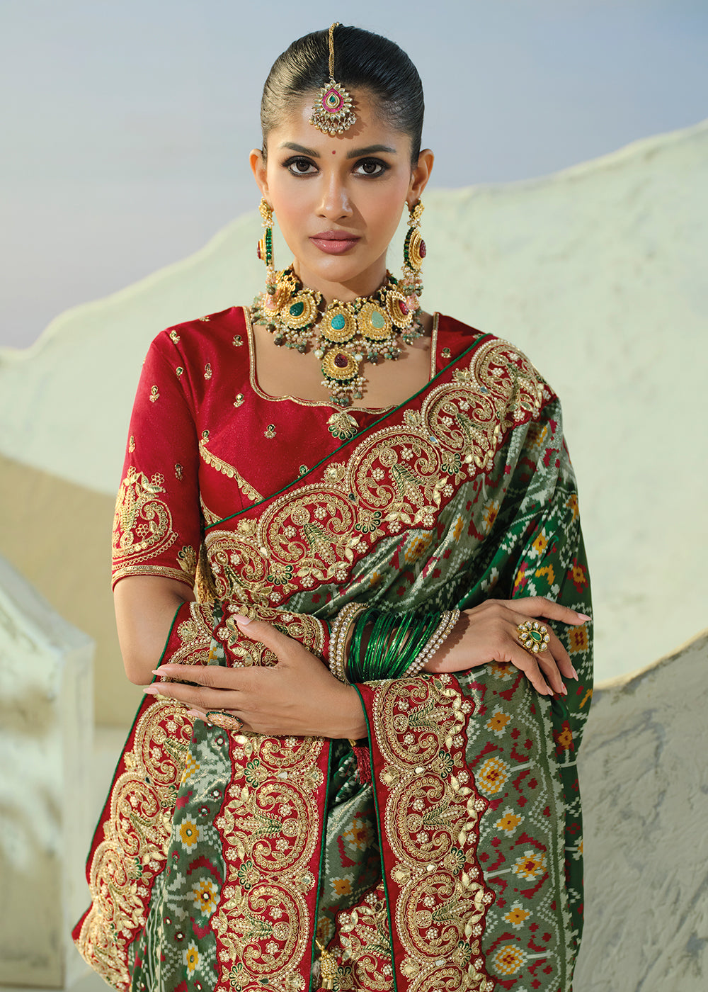 Buy Now Royal Green Patan Patola Style Traditional Wear Saree Set Online in US, UK, Canada, France, Germany, Denmark, Sweden, Austria & Worldwide at Empress.
