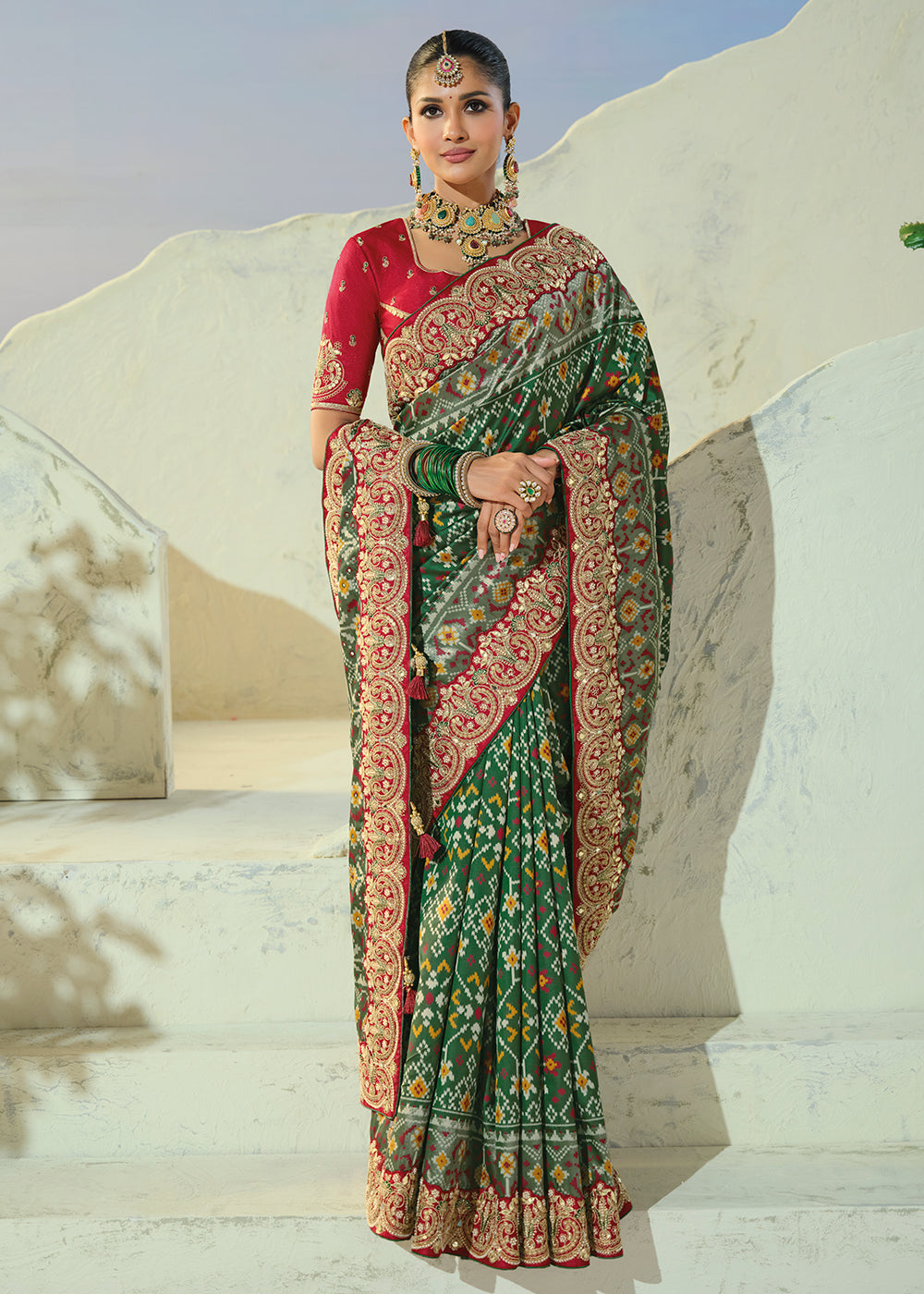 Buy Now Royal Green Patan Patola Style Traditional Wear Saree Set Online in US, UK, Canada, France, Germany, Denmark, Sweden, Austria &amp; Worldwide at Empress.