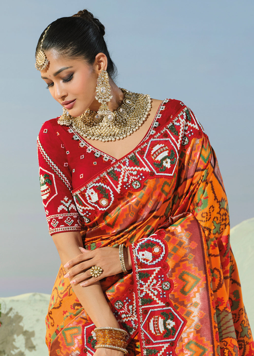 Buy Now Royal Orange Patan Patola Style Traditional Wear Saree Set Online in US, UK, Canada, France, Germany, Denmark, Sweden, Austria &amp; Worldwide at Empress.