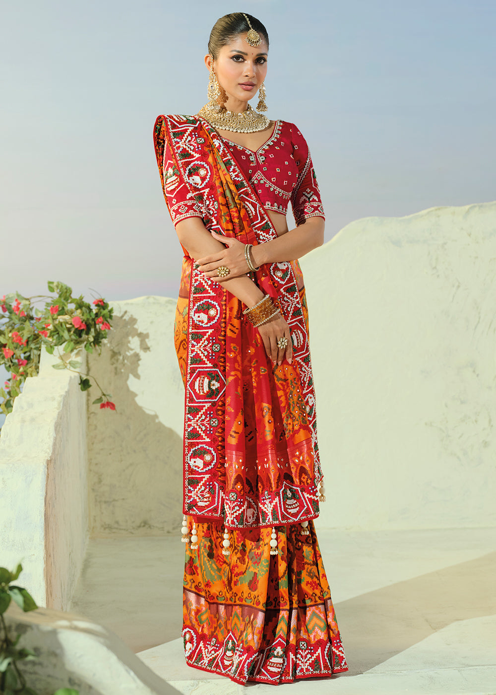 Buy Now Royal Orange Patan Patola Style Traditional Wear Saree Set Online in US, UK, Canada, France, Germany, Denmark, Sweden, Austria &amp; Worldwide at Empress.