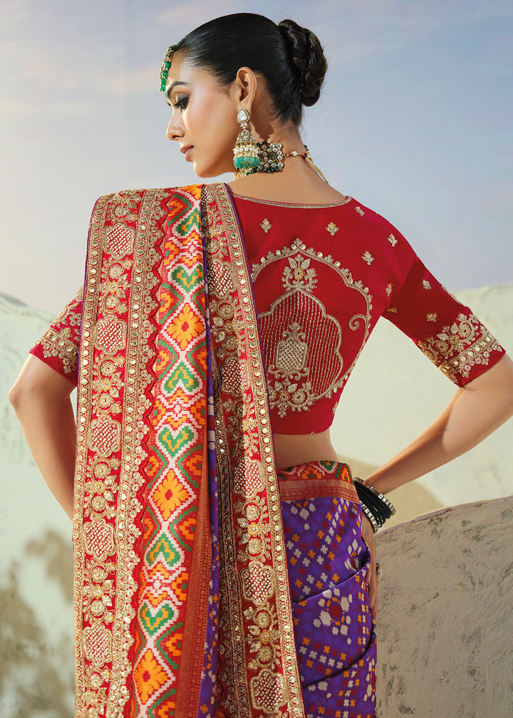 Buy Now Divine Purple Patan Patola Style Traditional Wear Saree Set Online in US, UK, Canada, France, Germany, Denmark, Sweden, Austria &amp; Worldwide at Empress.