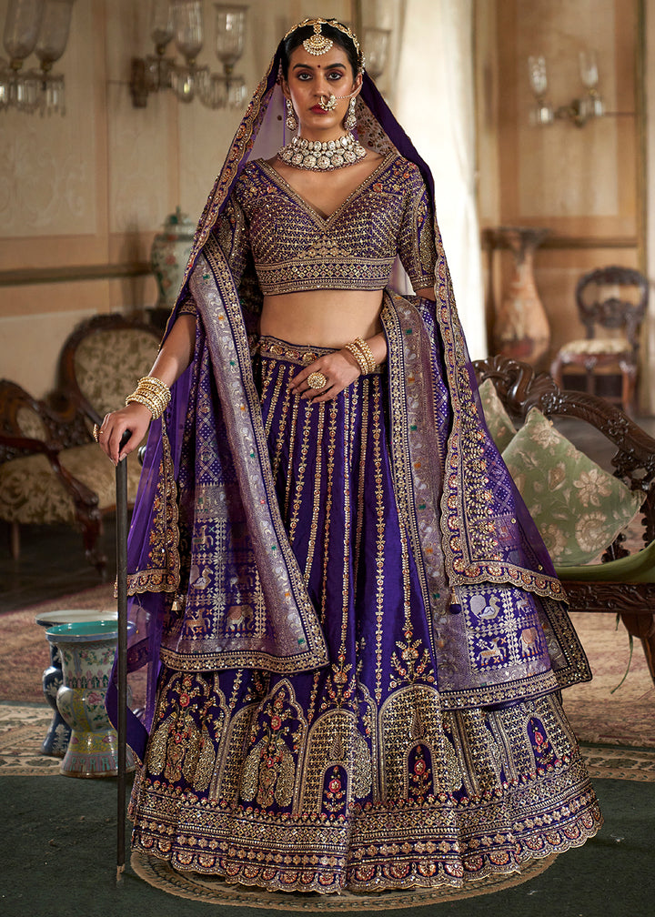 Buy Now Violet Purple Sabyasachi Inspired Bridal Silk Lehenga Choli Online in US, UK, Canada, France, Italy, Germany, Austria, Denmark & Worldwide at Empress.