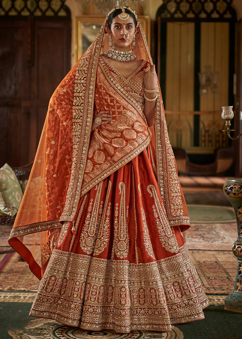 Buy Now Sabyasachi Inspired Rust Orange Bridal Silk Lehenga Choli Online in US, UK, Canada, France, Italy, Germany, Austria, Denmark, UAE & Worldwide at Empress.