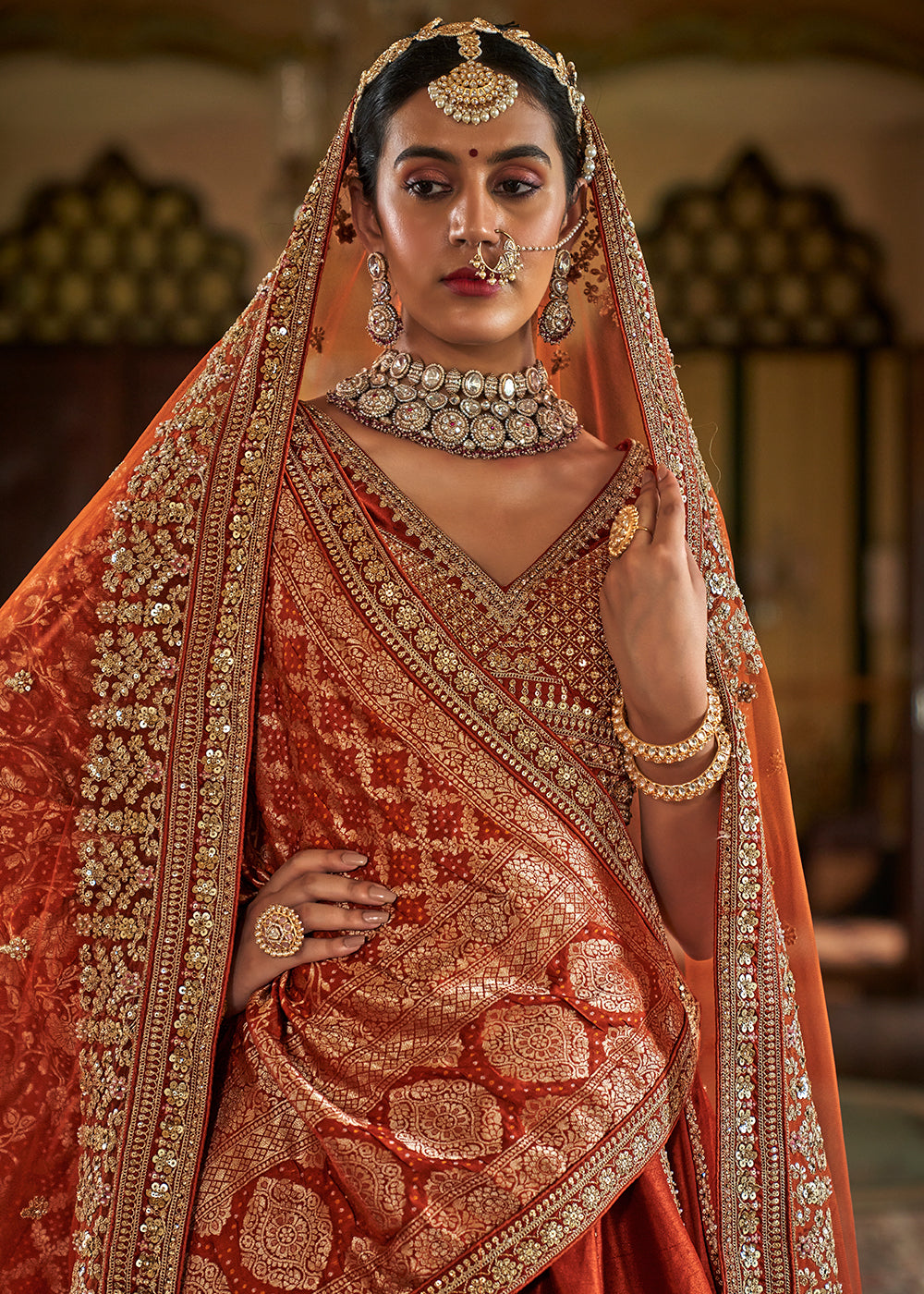 Buy Now Sabyasachi Inspired Rust Orange Bridal Silk Lehenga Choli Online in US, UK, Canada, France, Italy, Germany, Austria, Denmark, UAE & Worldwide at Empress.