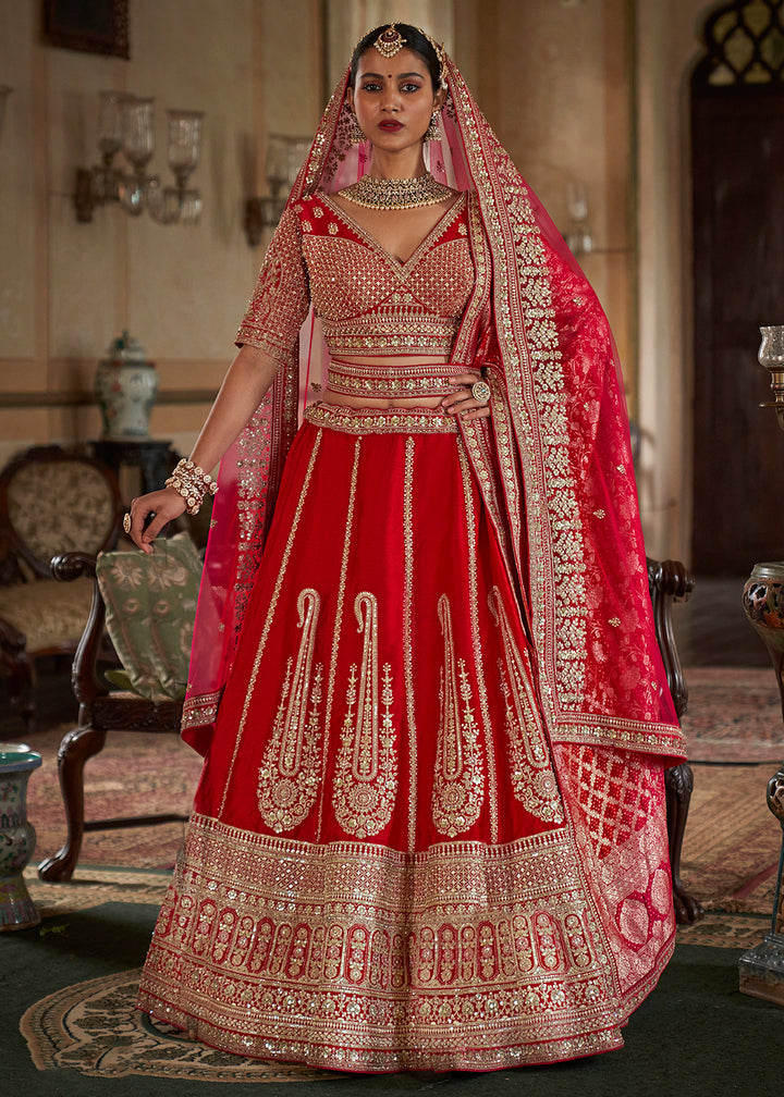 Buy Now Sabyasachi Inspired Cherry Red Bridal Silk Lehenga Choli Online in US, UK, Canada, France, Italy, Germany, Austria, Denmark, UAE & Worldwide at Empress