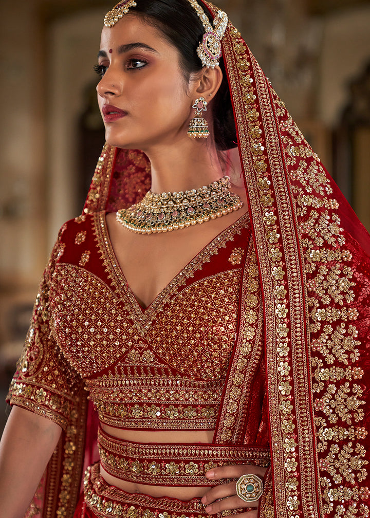 Buy Now Sabyasachi Inspired Cherry Red Bridal Silk Lehenga Choli Online in US, UK, Canada, France, Italy, Germany, Austria, Denmark, UAE & Worldwide at Empress