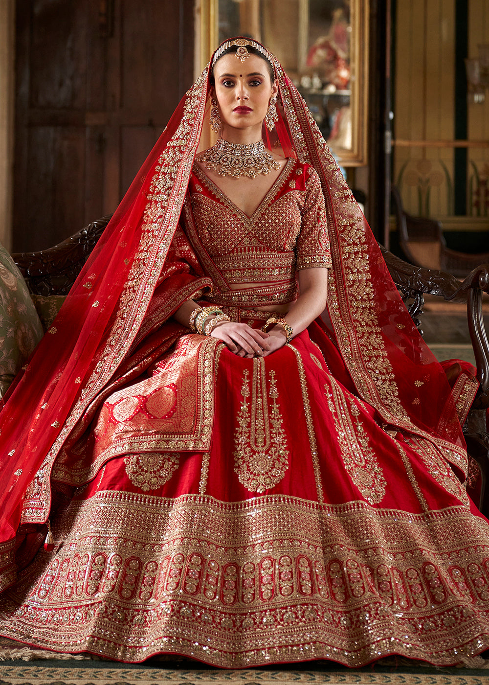 Buy Now Sabyasachi Inspired Cherry Red Bridal Silk Lehenga Choli Online in US, UK, Canada, France, Italy, Germany, Austria, Denmark, UAE & Worldwide at Empress