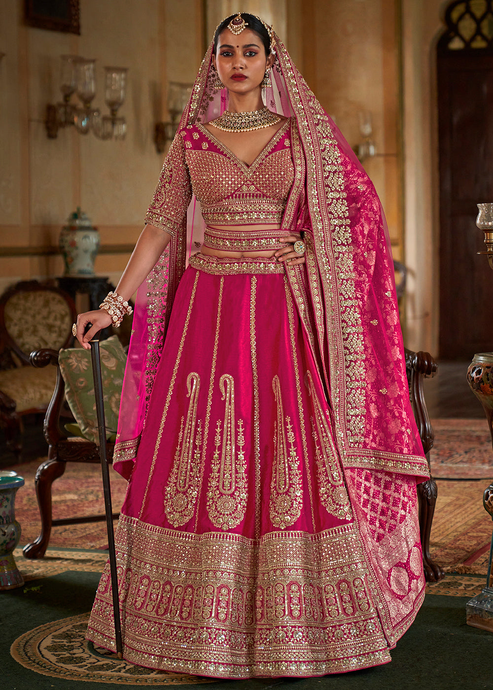 Buy Now Sabyasachi Inspired Rani Pink Bridal Silk Lehenga Choli Online in US, UK, Canada, France, Italy, Germany, Austria, Denmark & Worldwide at Empress.