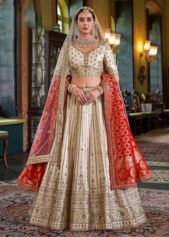 Buy Now Pearl White Bridal Silk Sabyasachi Inspired Lehenga Choli Online in US, UK, Canada, France, Italy, Germany, Austria, Denmark & Worldwide at Empress.