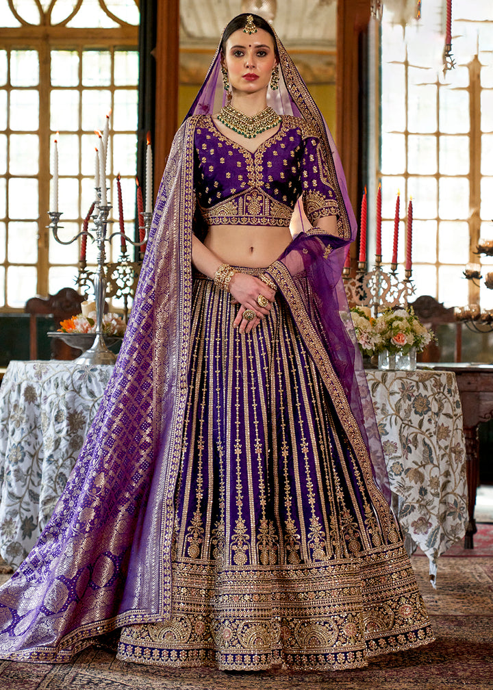Buy Now Violet Purple Bridal Silk Sabyasachi Inspired Lehenga Choli Online in US, UK, Canada, France, Italy, Germany, Austria, Denmark & Worldwide at Empress.