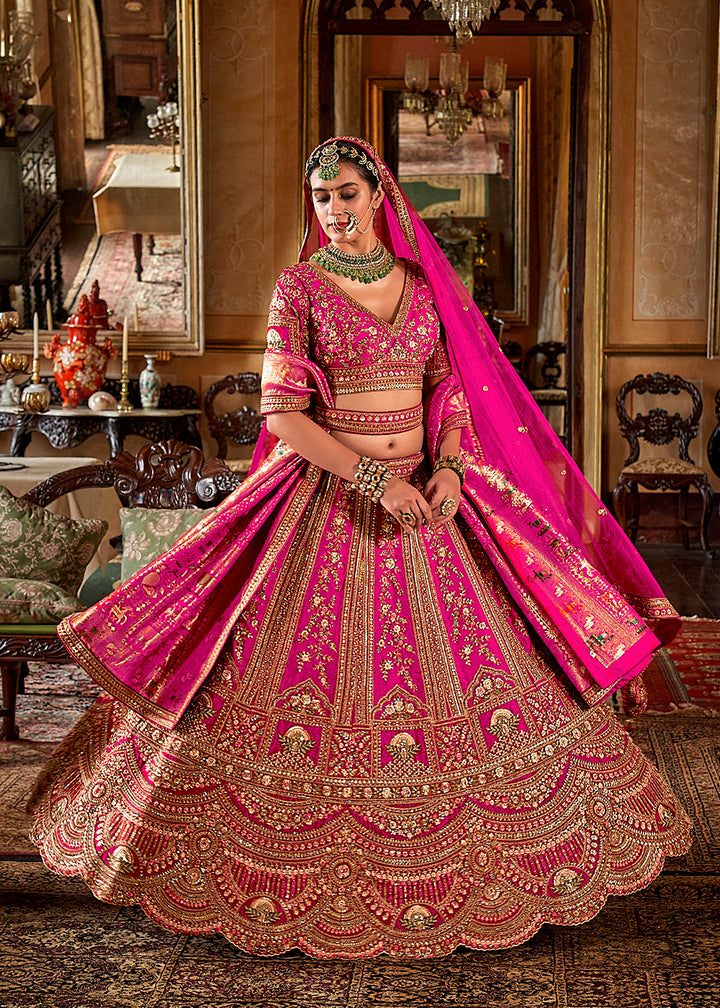 Buy Now Rani Pink Bridal Silk Sabyasachi Inspired Lehenga Choli Online in US, UK, Canada, France, Italy, Germany, Austria, Denmark & Worldwide at Empress.